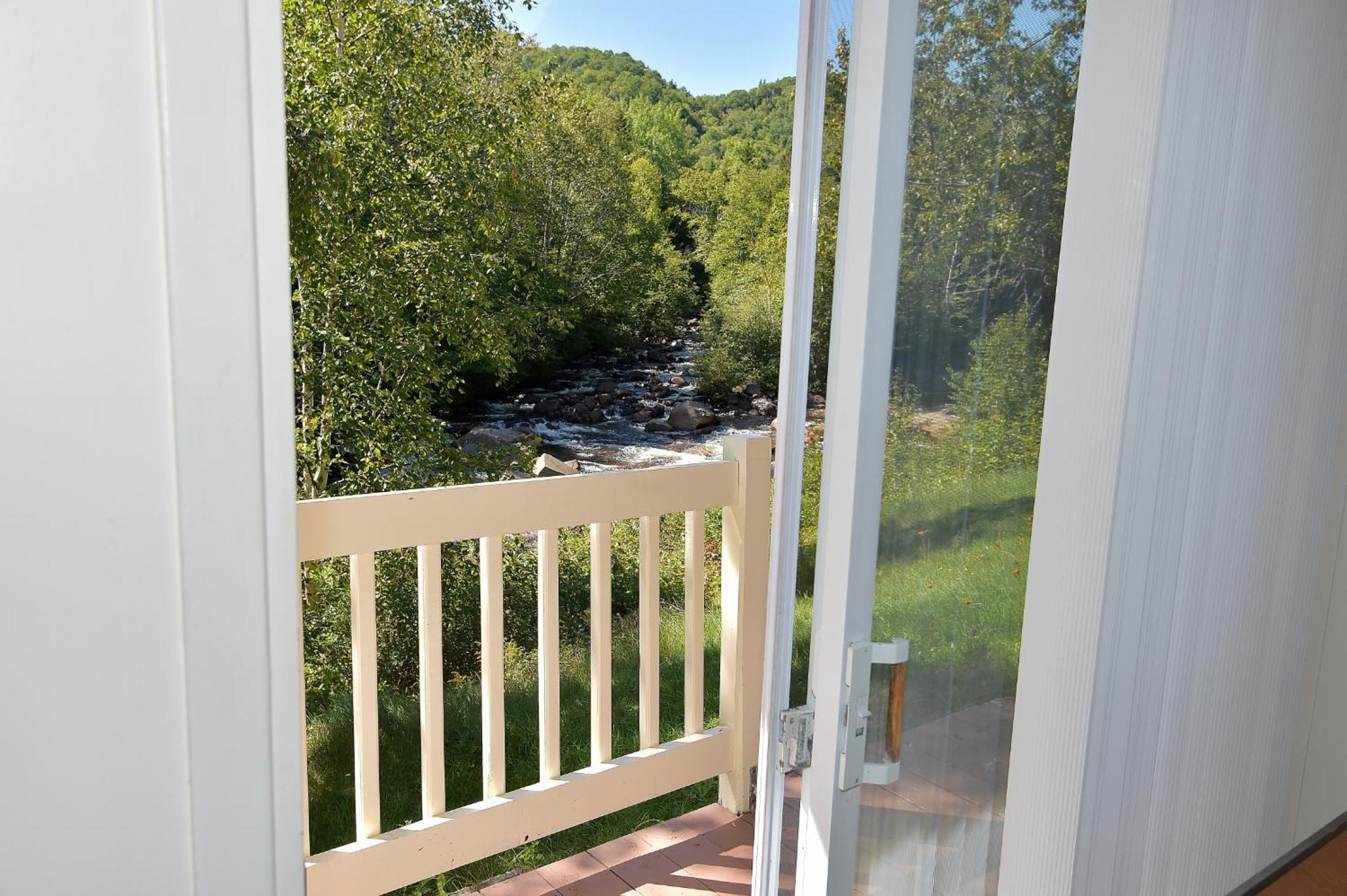 Motel Et Chalets Bo-Fleuve Evangeline Saint-Siméon Quarto foto